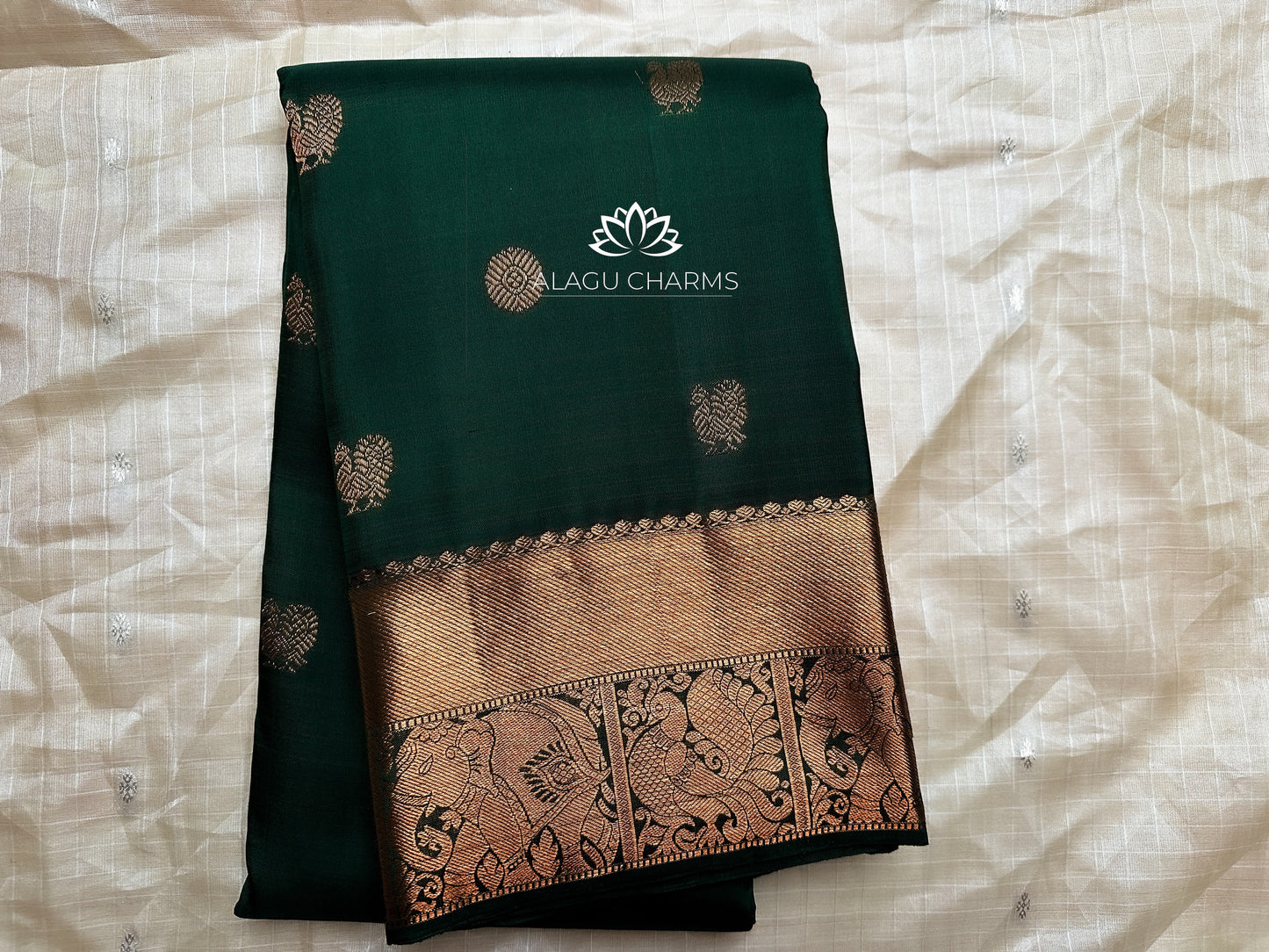 Dark Green Kanchipuram Silk Saree with Rose Gold jari