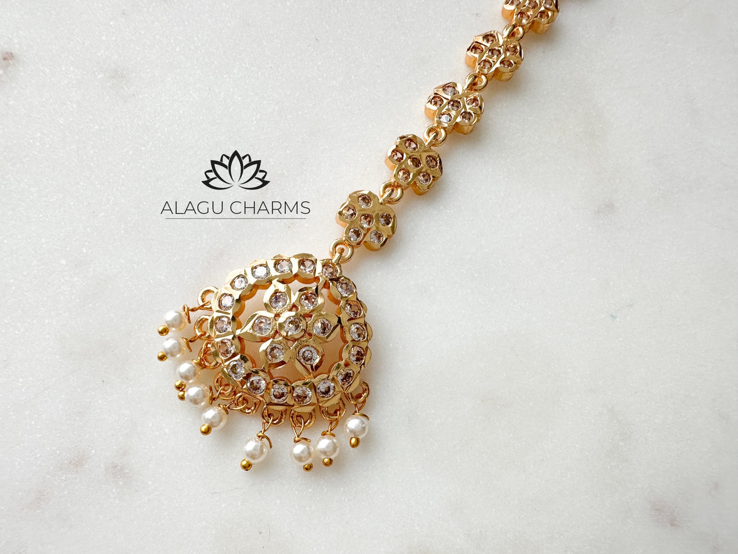 MITHRA- impon tikka with beads