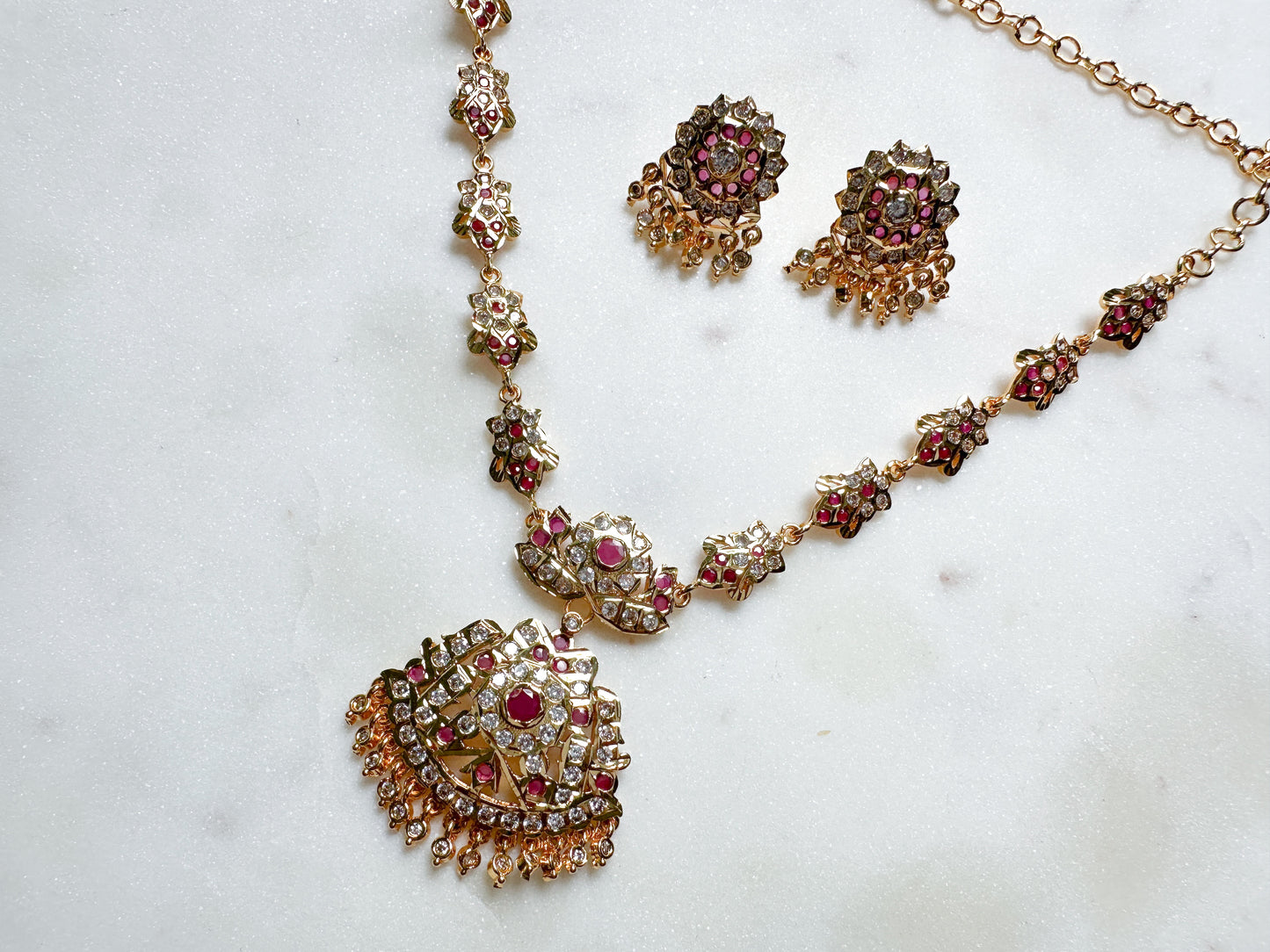 Vahini- Impon Necklace Set (clear & ruby stone)