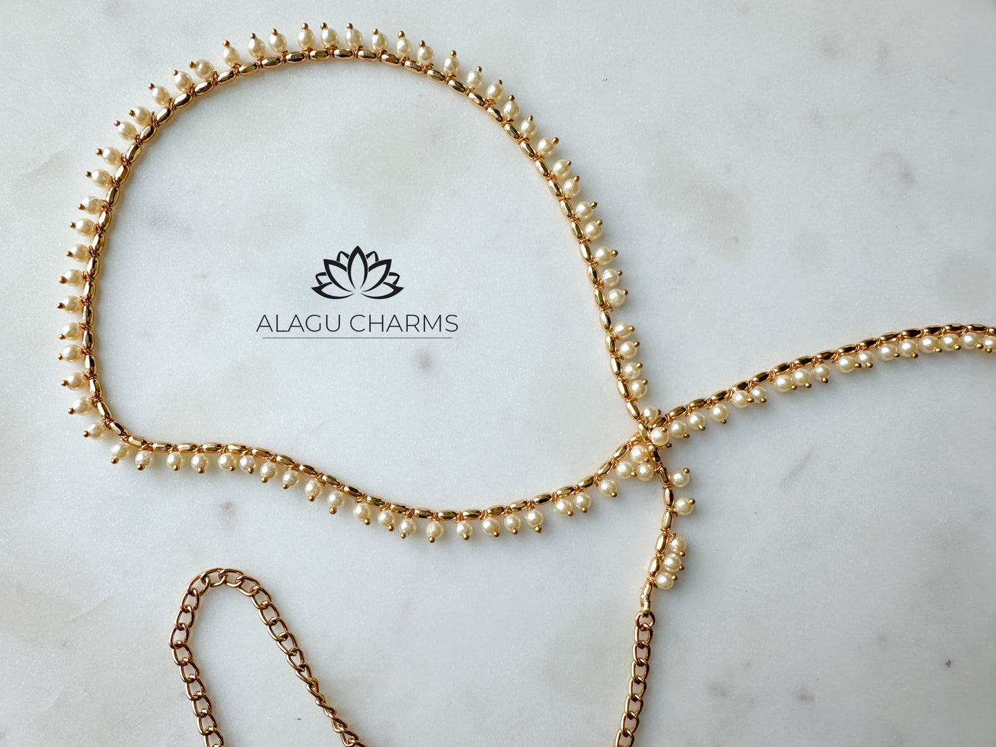 Kaja- Gold waist chain with pearls