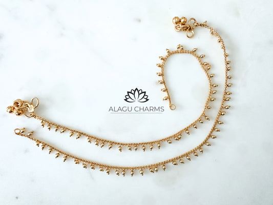 Gold anklets with gold pearls