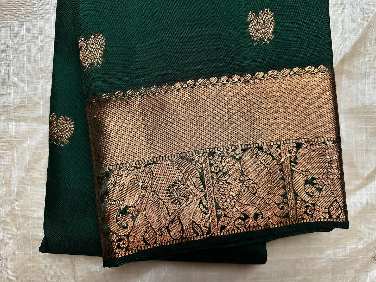 Dark Green Kanchipuram Silk Saree with Rose Gold jari