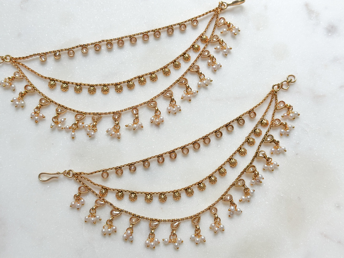 Traditional gold ear chains