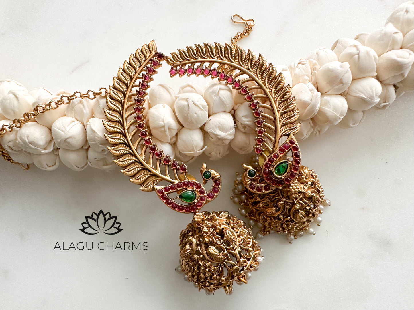 Antique gold peacock jhumka with ear chain