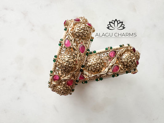 Antique gold statement bangles with stones and pearls