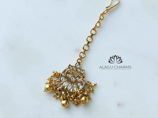 Tikka with gold beads