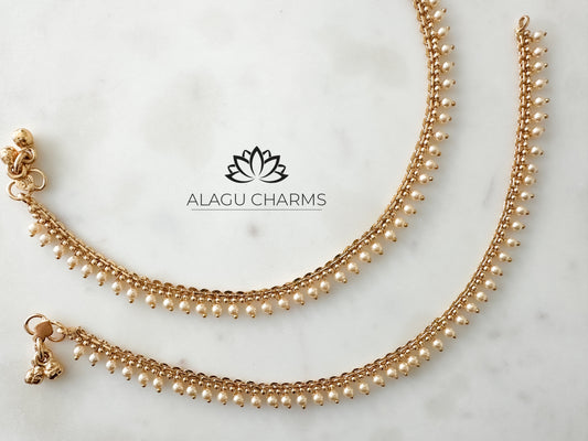 Gold anklets with pearls