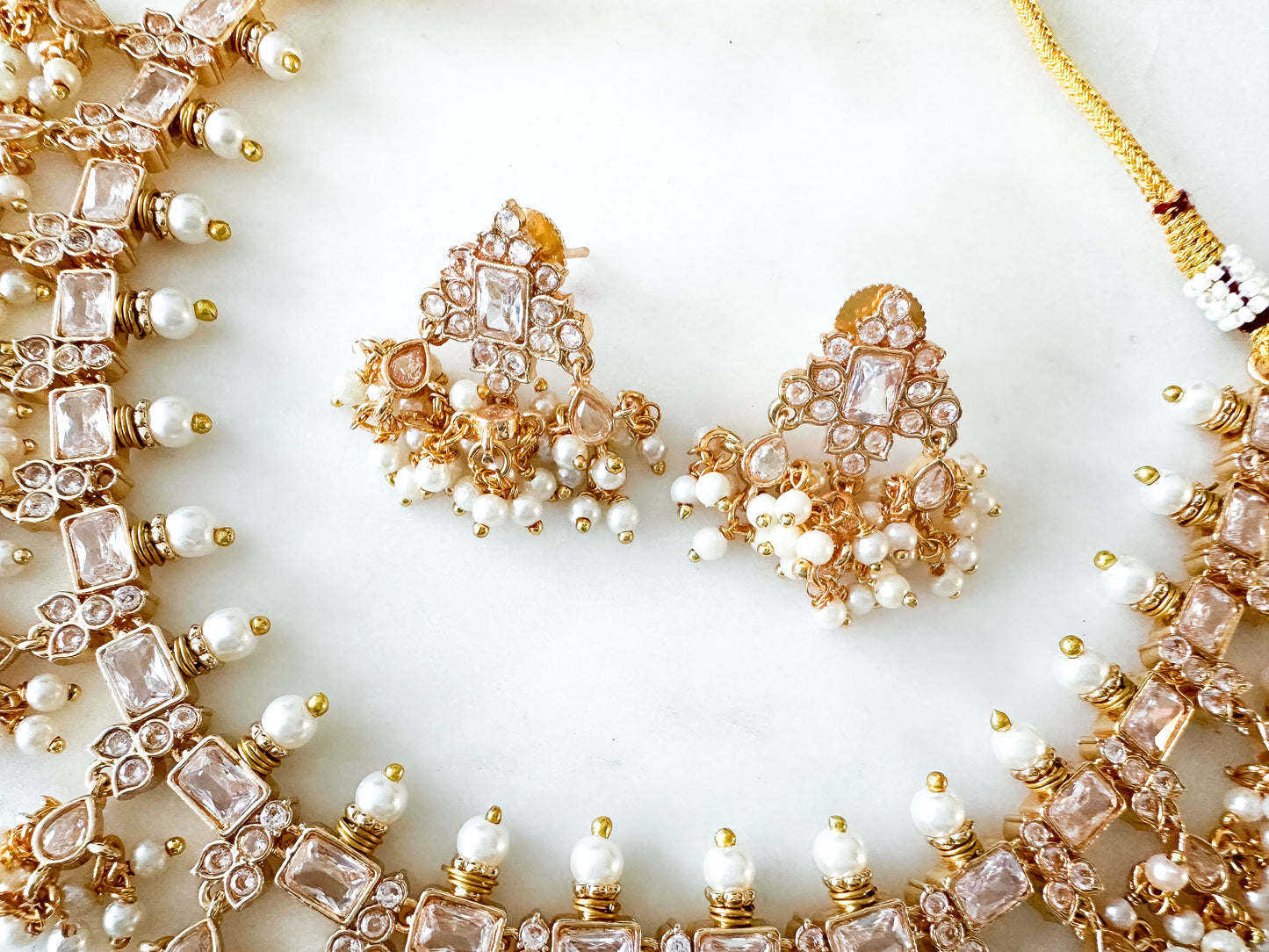 Narthana- Gold necklace set with clear stones